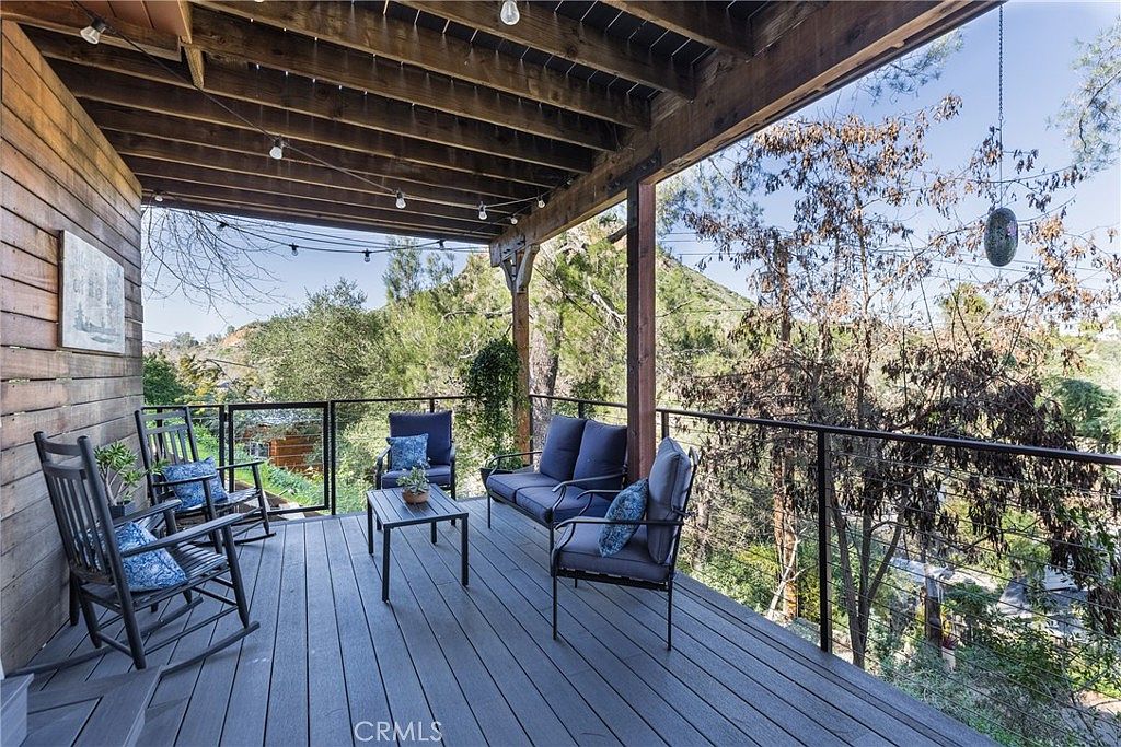 Wraparound composite deck with mountain and lake views