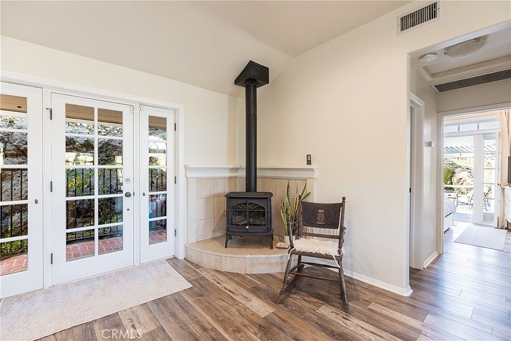 Hallway with wood floors and natural light