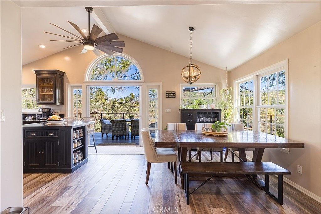 Landscaped patio and mature tree setting